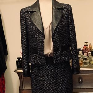 Authentic vintage Chanel tweed and lamb skin suit